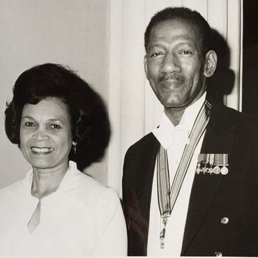 Dr. Arthur Wint and wife, Mrs. Norma Wint, attend official functions at the Jamaican High Commission
