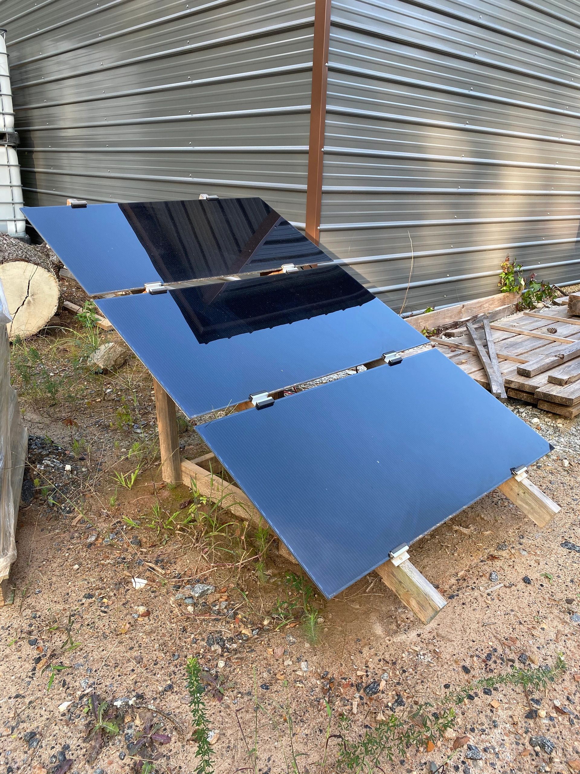 Three solar panels on Macgyver stand
