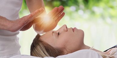Woman receiving reiki