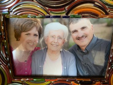 One of my favorite pictures of The Rooster, the Mother Hen and Baby Chick