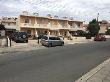 Complex in Universal, Paphos. 6 Town Houses Painted in Magnolia and Architectural Peach.