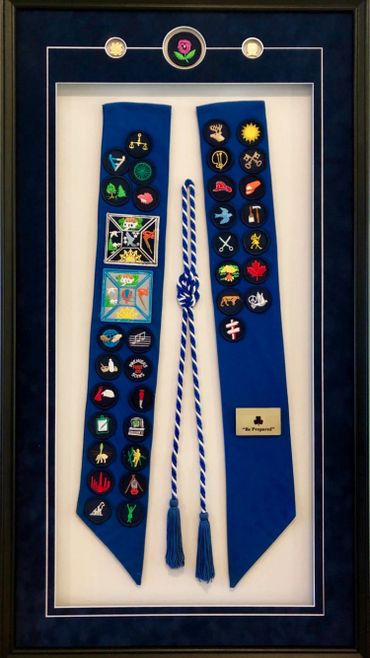 Custom framed Girl Guide sash and all round cord along with custom plate.