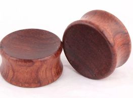 Wooden plugs piercing