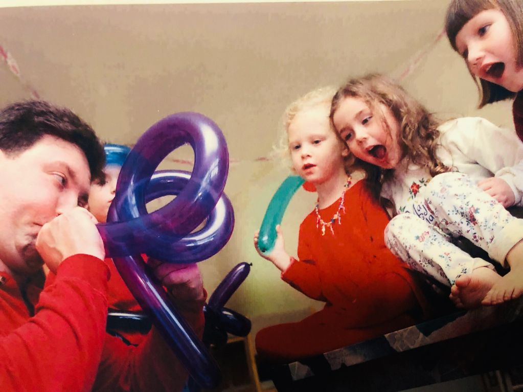Balloon twisting & Magic bring smiles