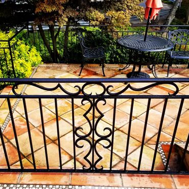 Patio guard railing forged and fabricated to match existing work