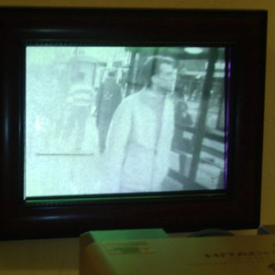 Man displayed on a small old screen