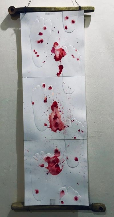 Bloody stains over foot prints