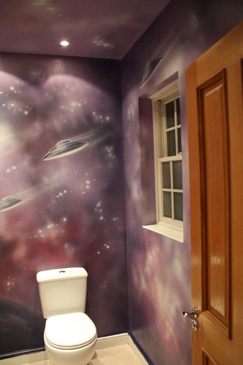 UFOs in a bathroom mural