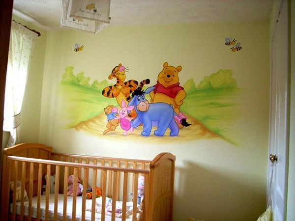 Winnie the Pooh painted in a girls nursery room