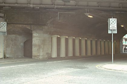 Also, there is a bridge of similar design, but of only 12 Doric columns wide, over Abbey Street, a b