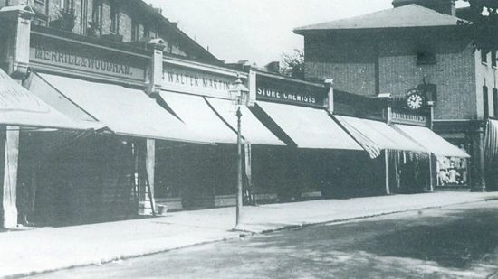 Another dynamic view Zola photographed was of a simple row of shops in Church Road, ending in a big