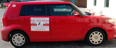 Red vehicle used for service repair of office equipment, copiers fax printers and computers.
