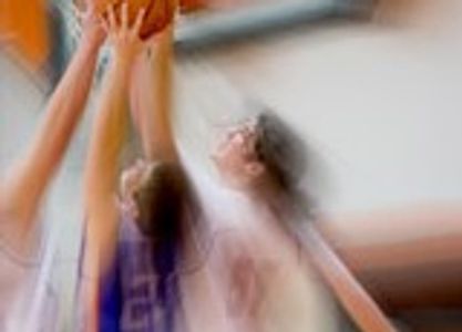 Blurred image of player shooting the basketball