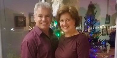 Theo and Ganine Derleth-owners-Dancing Gardens Lake Hartwell-both smiling to camera-same color shirt
