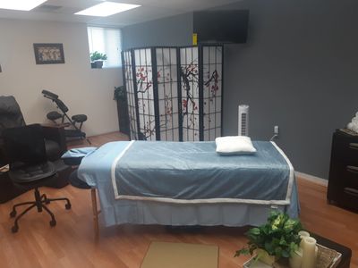 Massage Table inside Queens Palace Beauty and Wellness Studio