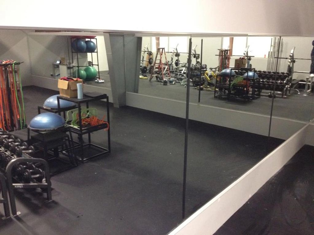 Mirror walls done in a gym