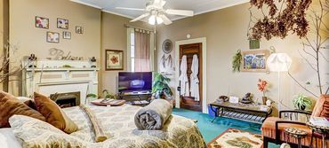 A photo of the lovely Nature & Earth Room with water fountain and birds nest in a tree!