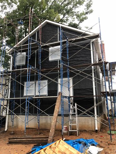 scaffolding around a house