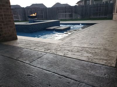 Wood and texture stamped concrete