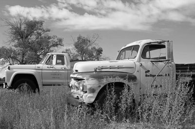 Old trucks on Highway 66 or Historic Route 66. Relics of Route 66 Transportation