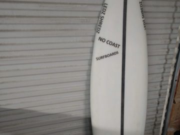 custom hand shaped surfboards.  Email for quotes