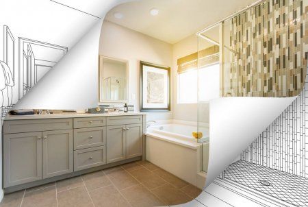 A modern bathroom transitioning from blueprint to finished design.