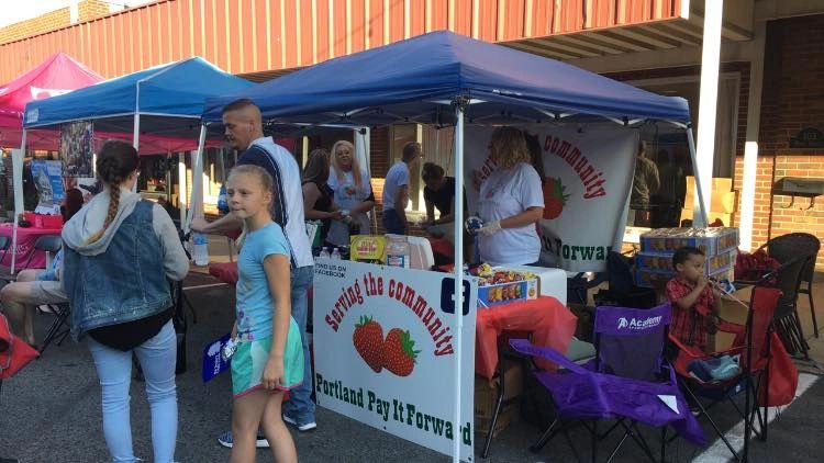 Portland Pay It Forward's outdoor booth during a local community event in Portland Tennessee. 
