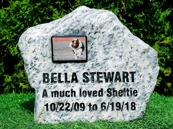 Engraved river rock pet memorial with colour porcelain photo applique.