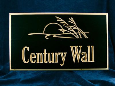 Wood plaque engraved with CNC machining using the VCarve method.