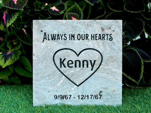 Memorial stone on granite paver.
