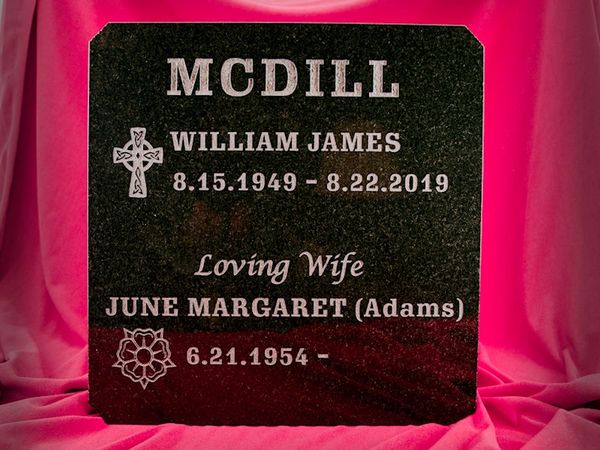 Engraved black granite columbarium door