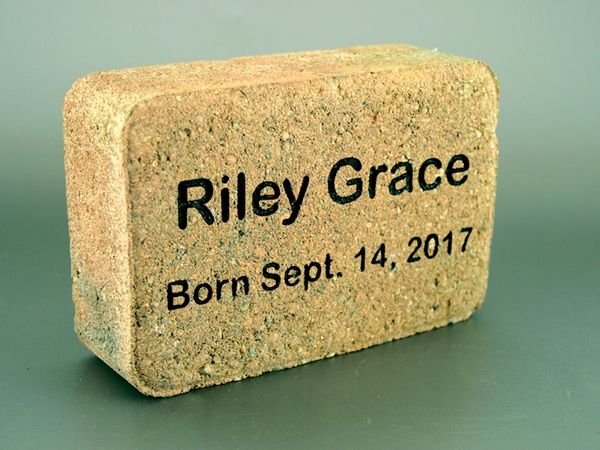 Engraved cobble stone.