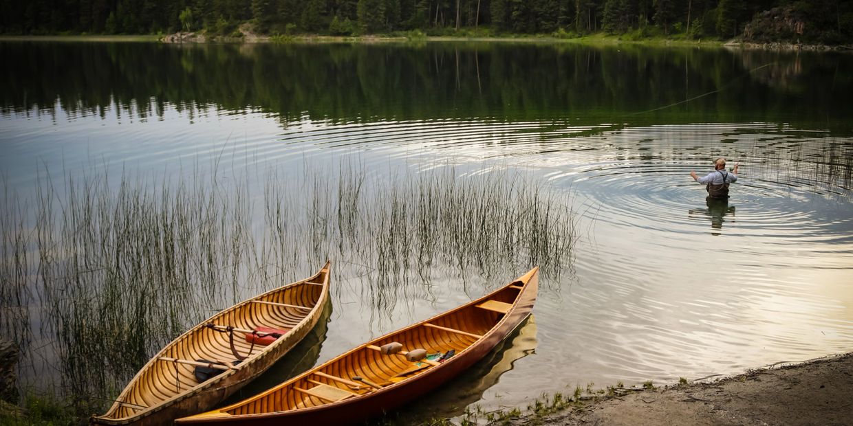 Wood-Canvas canoe built by Tom & Meagen Healy.  Birch Bark Canoe built by Kyle "Lindy" Lind.