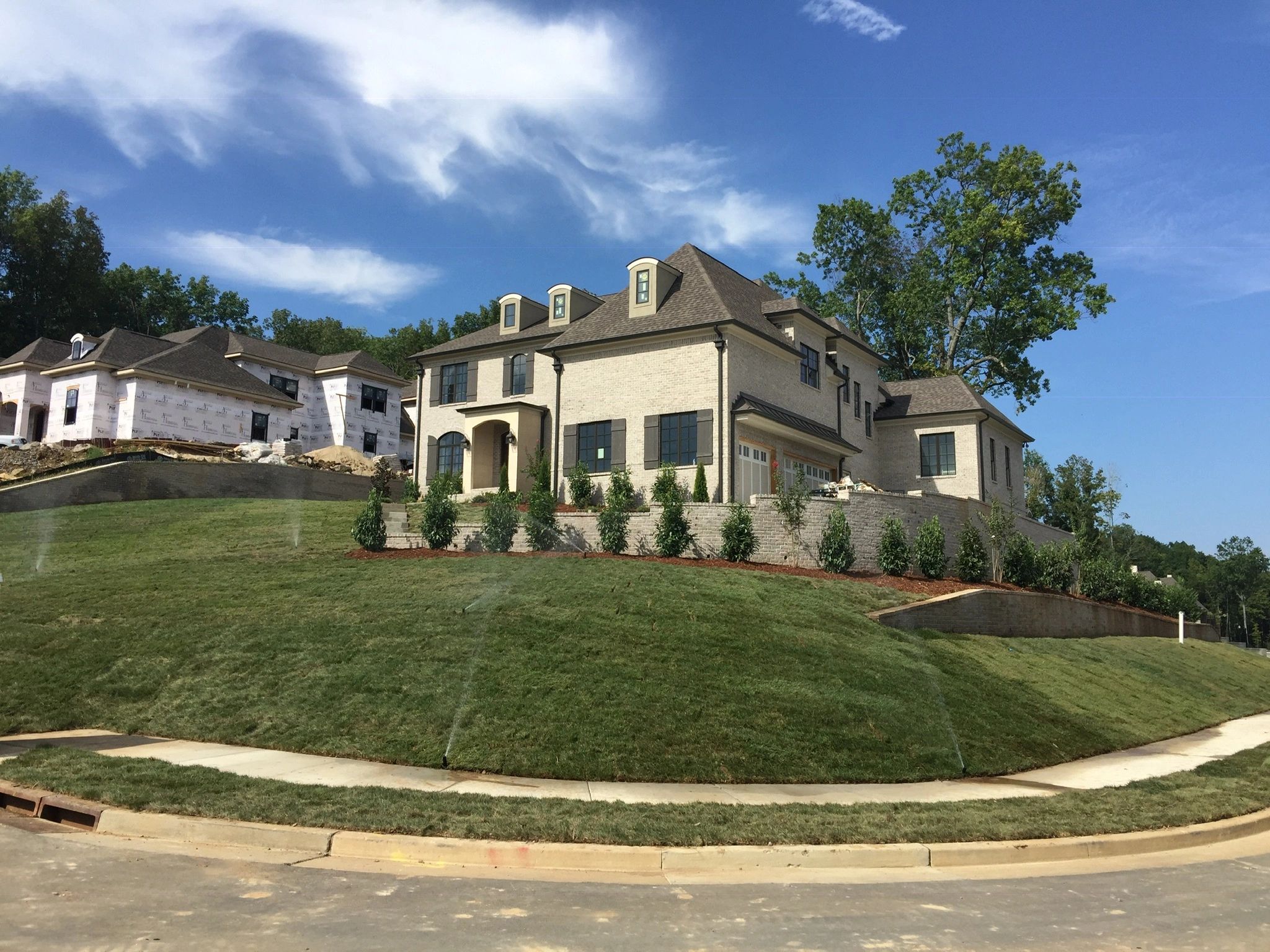 Sod, landscaping, irrigation, retaining wall, mulch