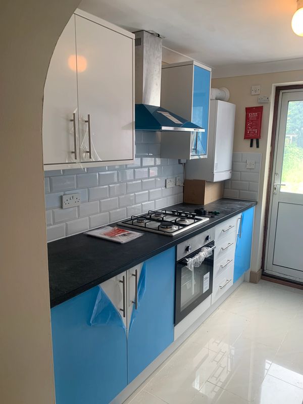 new kitchen installation with new electrical outlets and new gas boiler and hob