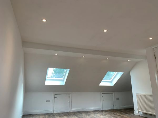 loft conversion completed with two velux windows central heating,spotlights and laminate flooring