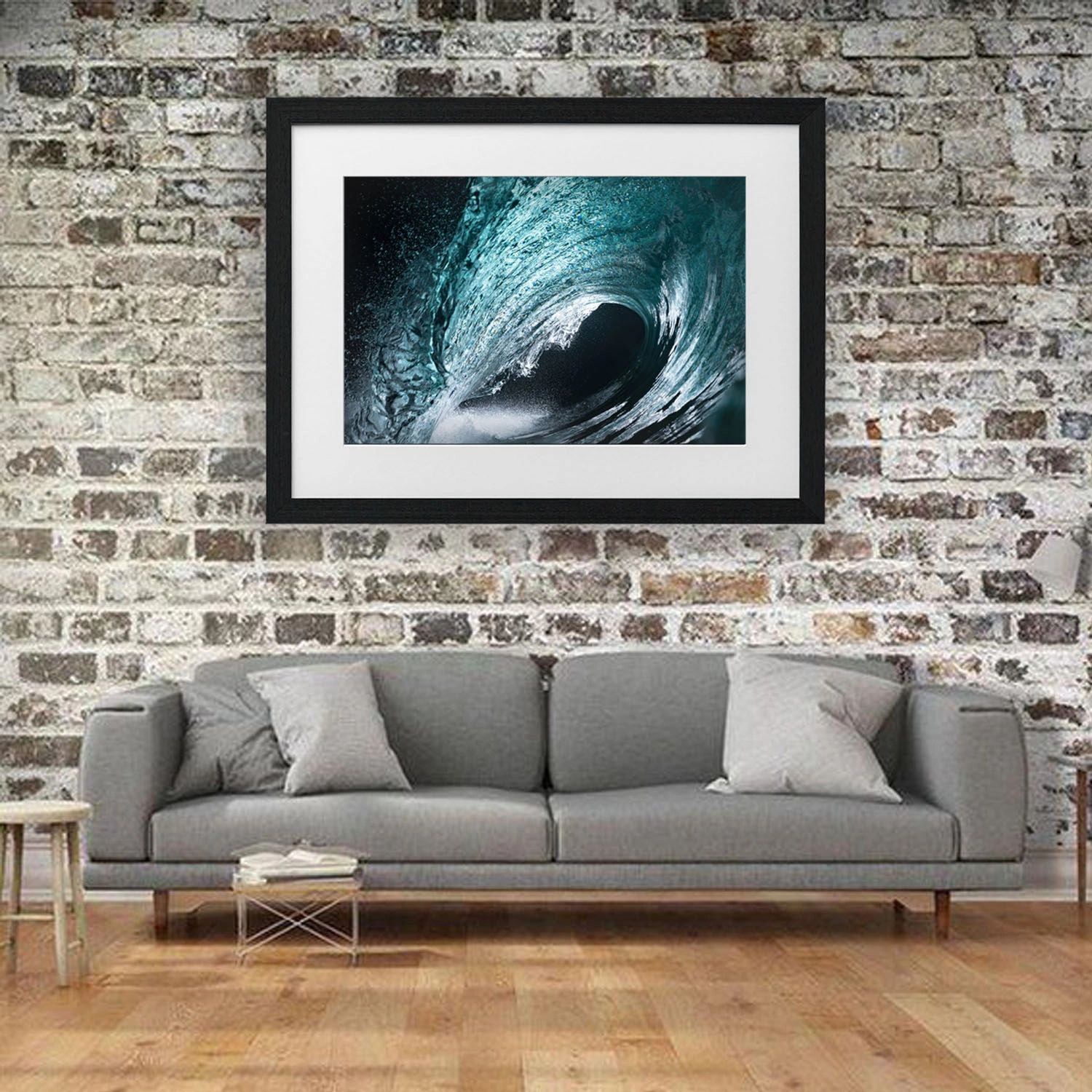 Mathew Tildesley swimming in the ocean with his camera