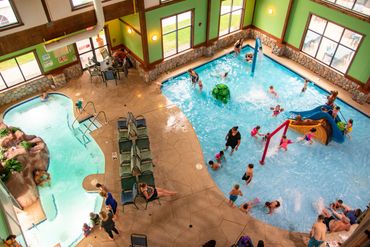 Aerial of whirlpool and kid's play area in the indoor waterpark