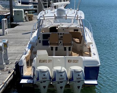 A view of the Charter Boat Metamorphosis. Triple 300 HP E-Tec Outboards