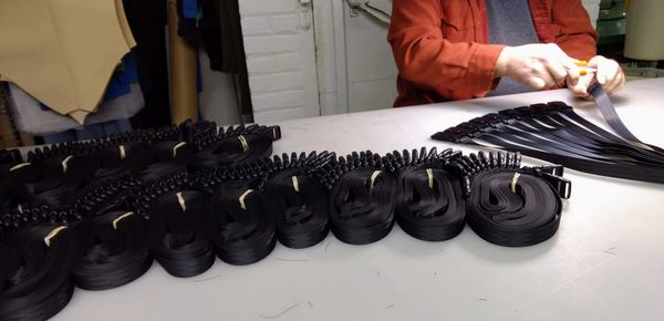Industrial webbing sewn and assembled into Straps.