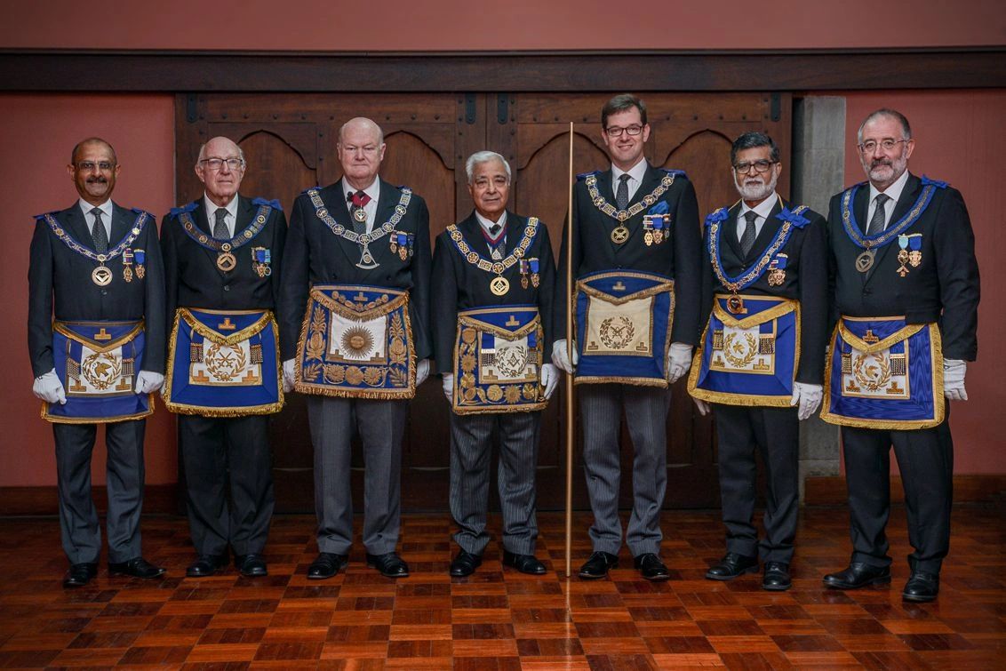 The RW DGM, The MW Pro Grand Master, and the Grand Secretary with Chain Officers of the District.