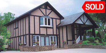 Sold at Real Estate Auction by
North American Auctioneers