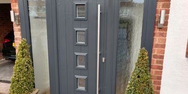 Anthracite Grey Solid Core door with Long Bar handle fitted by Worksop Composite Doors in Worksop.