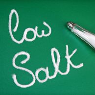 “Low salt” message with salt shaker.