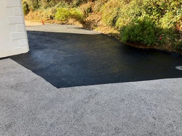 Tarmac surface sealing in progress - The low cost rejuvenation option...