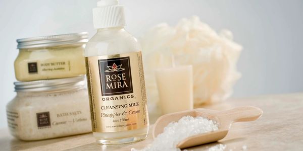 cleansing milk with a gold and black label