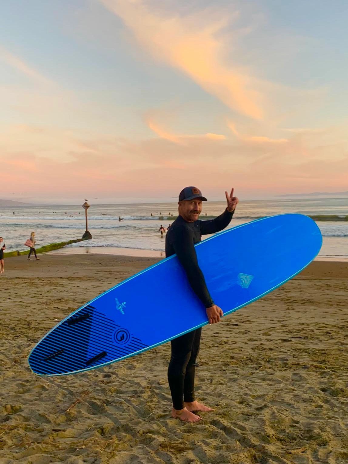 surf surfboard longboard foamboard foamie mustache beach sunset sunrise pink clouds sand ocean wave