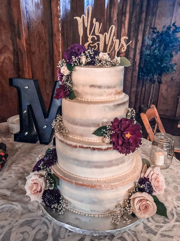 naked iced cake, fresh flowers
