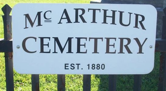 The McArthur Cemetery sign