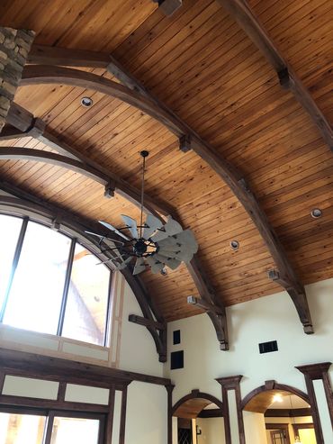 <img src="ceiling.jpg" alt="house ceiling with wooden beams">